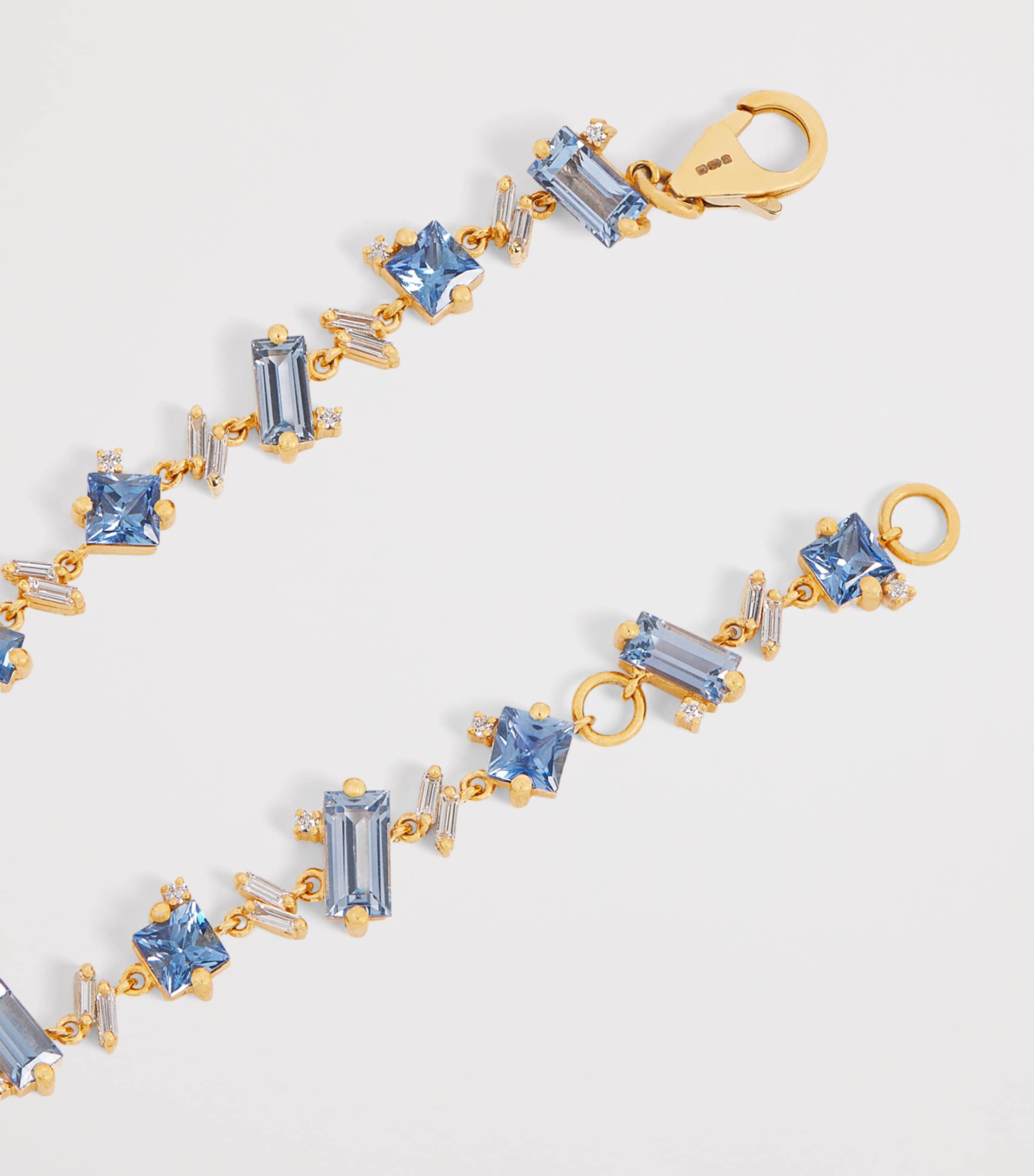 Suzanne Kalan yellow gold diamond and blue sapphire one of a kind bracelet, imported from the UK
