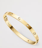 Cartier medium yellow gold and diamond LOVE bracelet, imported from the UK