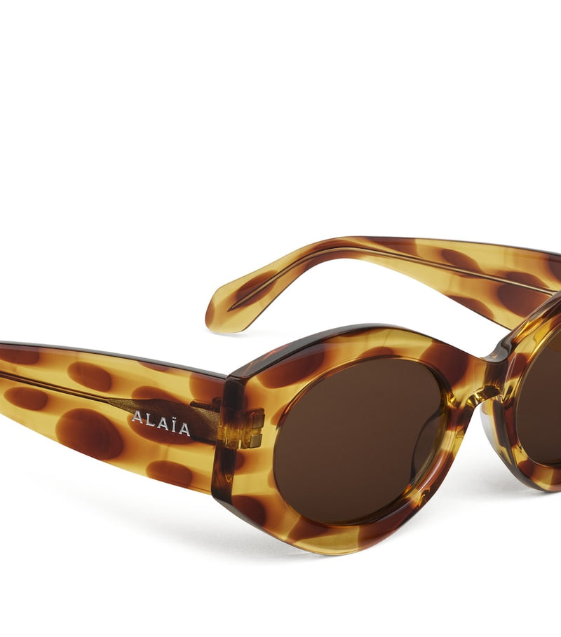 Alaïa speckled oval sunglasses (British brand)
