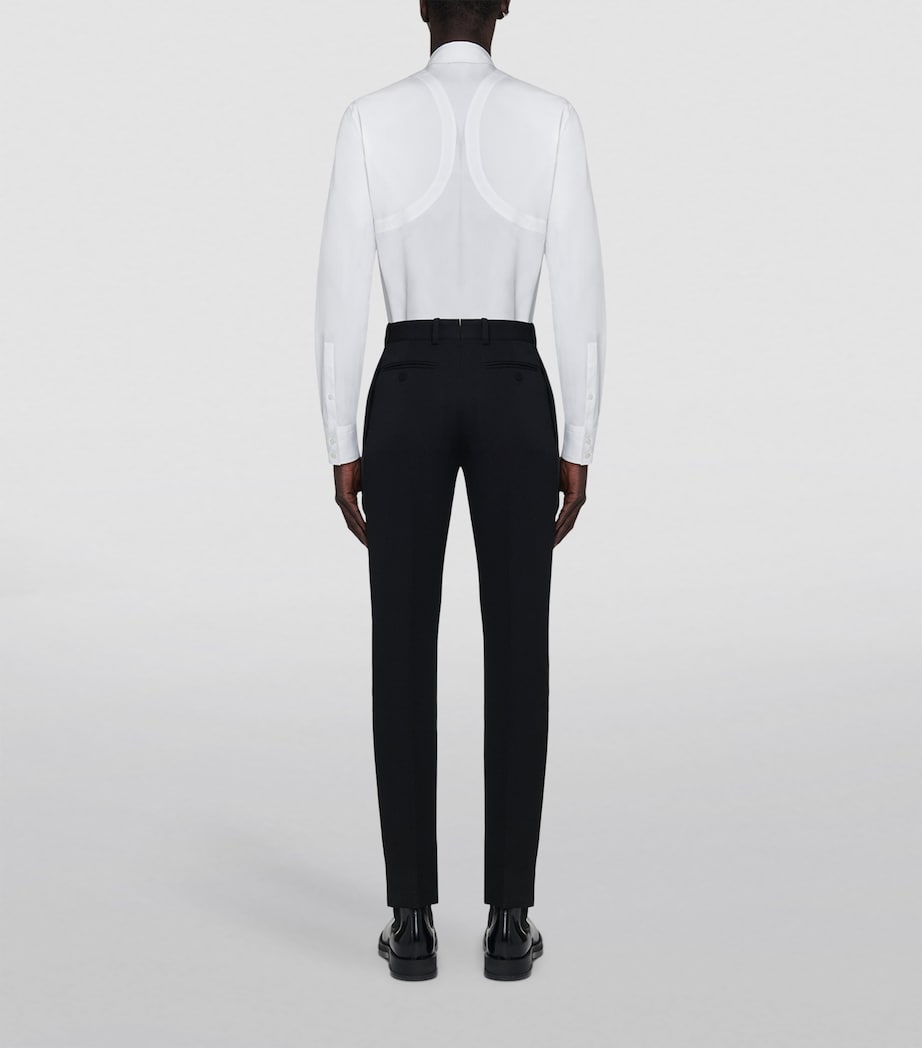 Pantalons ajustés en laine McQueen, importés du Royaume-Uni