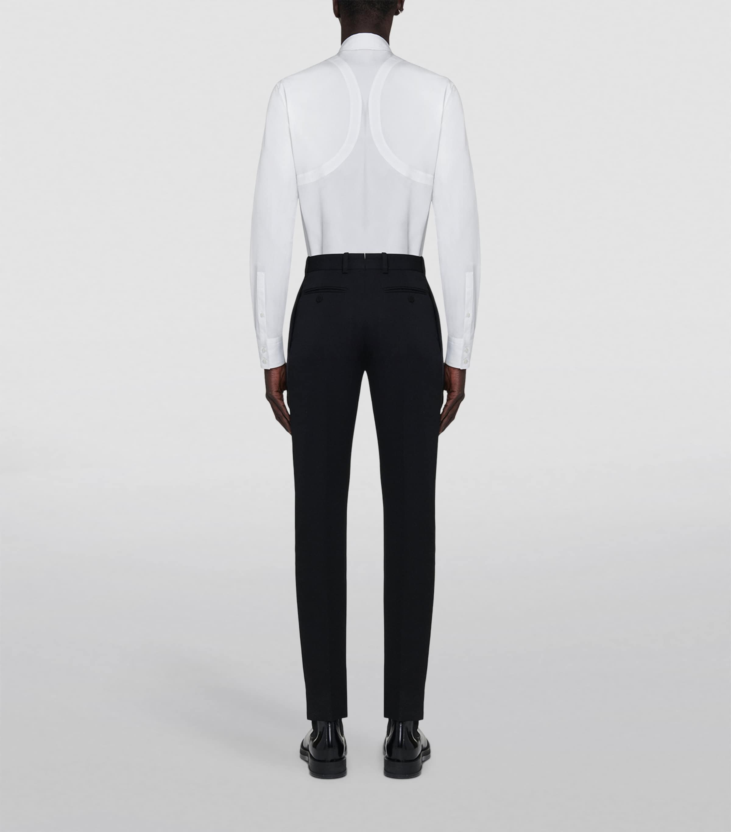 Pantalons ajustés en laine McQueen, importés du Royaume-Uni