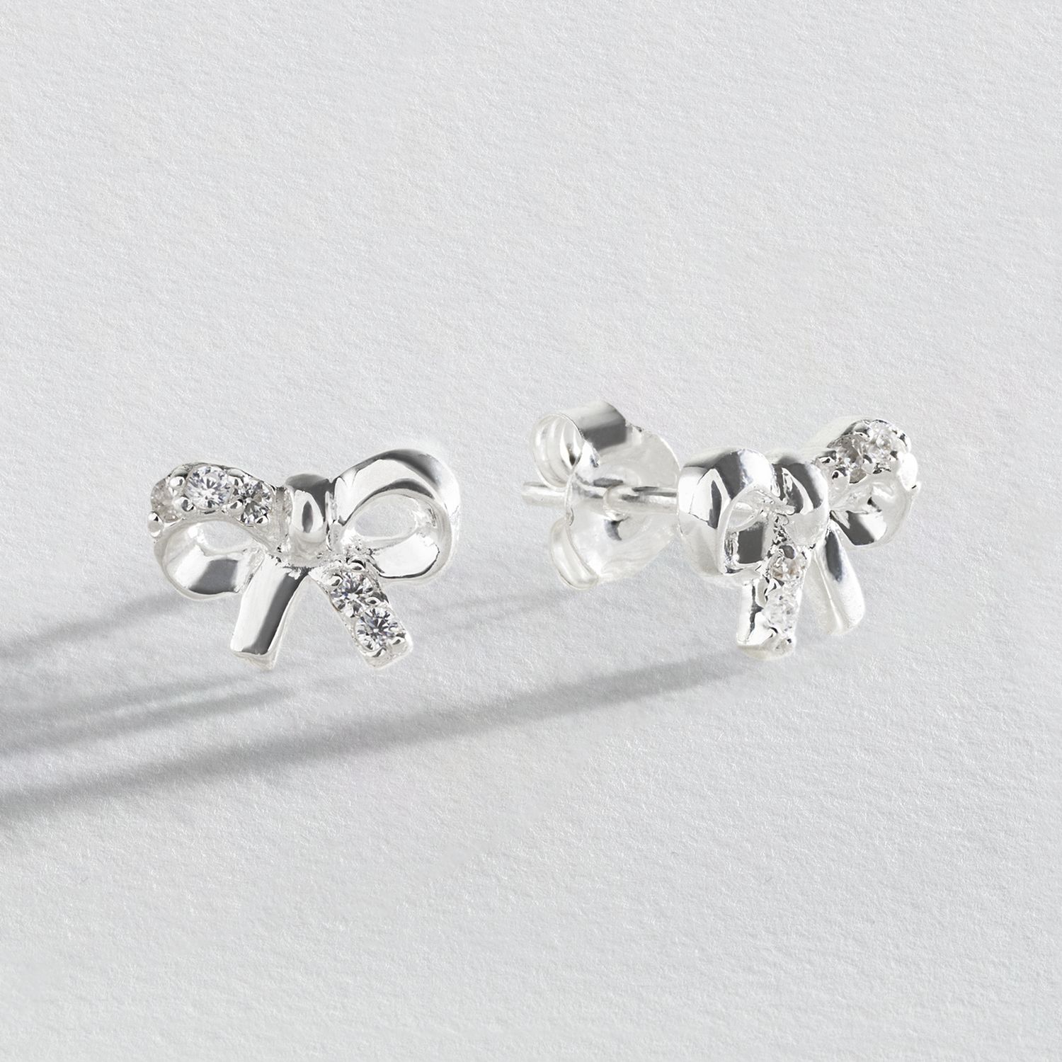 Revere sterling silver bow stud earrings cubic zirconia, imported from the UK
