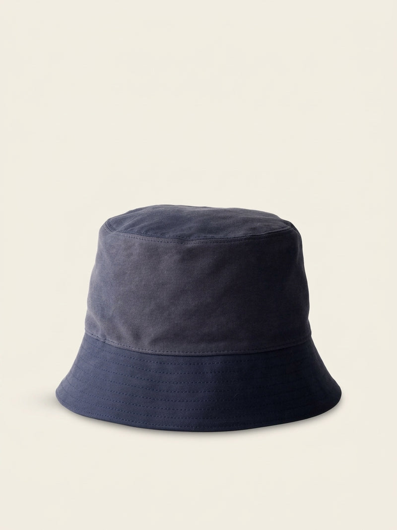 Prada satin bucket hat with metal triangle logo, imported from the UK