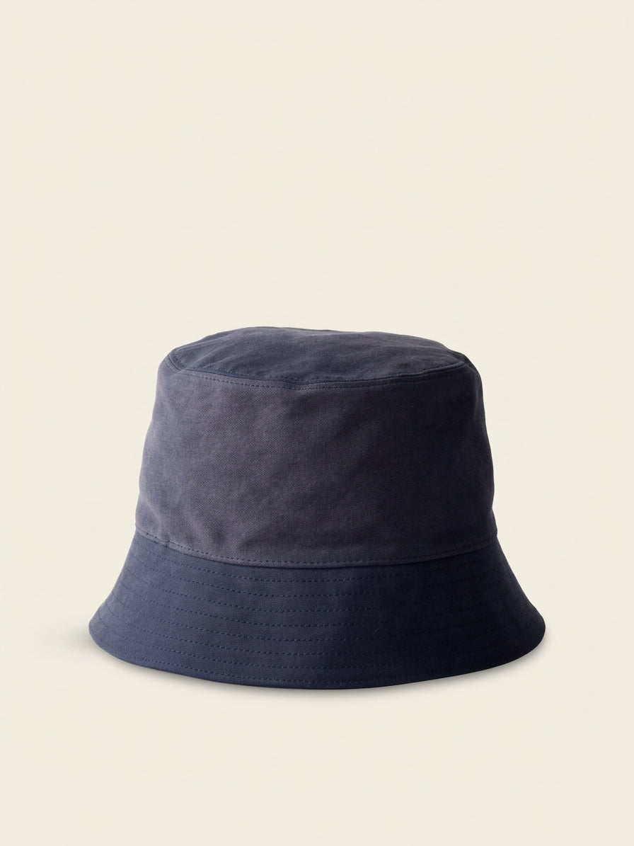 Prada satin bucket hat with metal triangle logo, imported from the UK