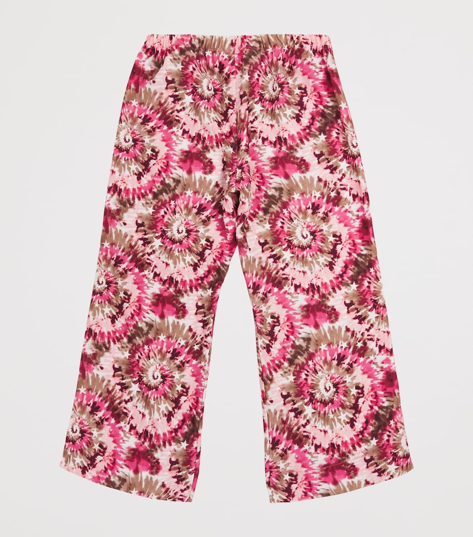 Palm Angels Kids spiral tie-dye trousers for ages 4-12+, imported from the UK