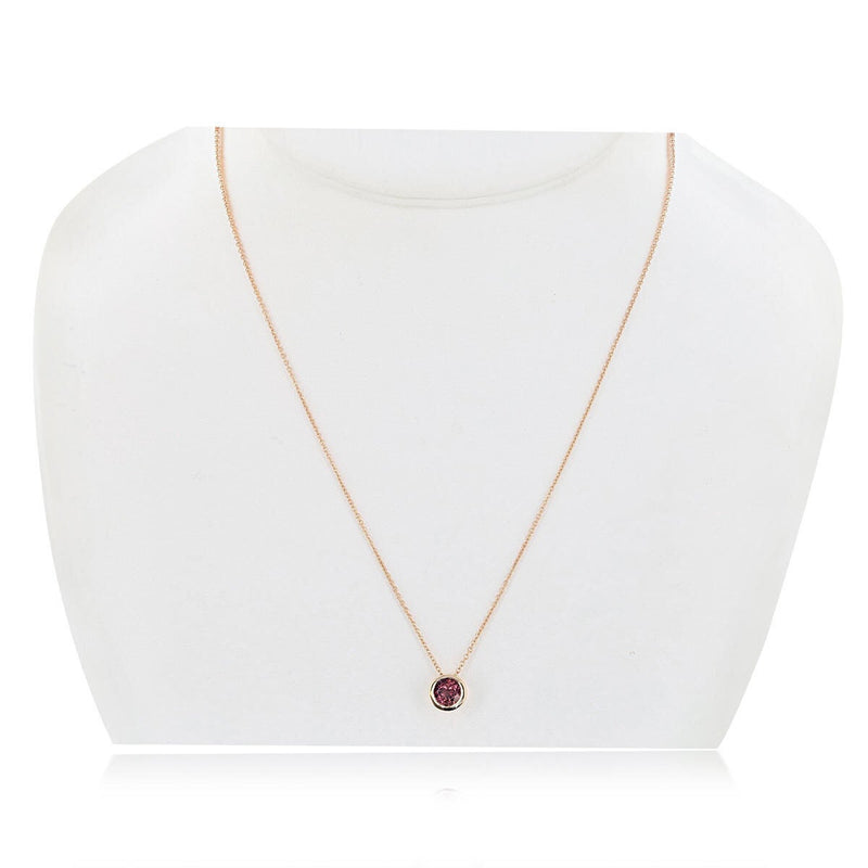 Round cut pink tourmaline pendant in 14ct rose gold (British brand)