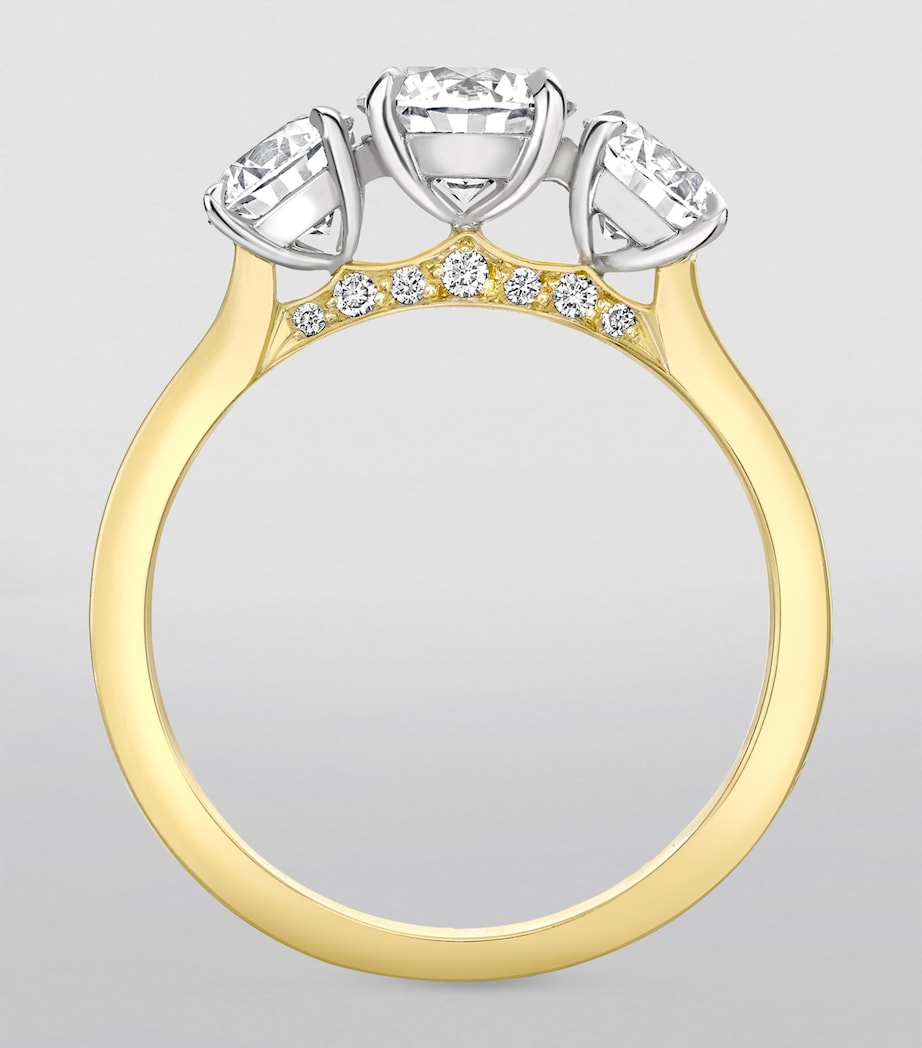 Boodles yellow gold platinum three stone diamond engagement ring, UK version