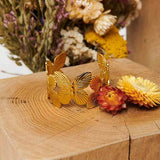 Izabel London butterfly metallic texture wide bracelet, UK version