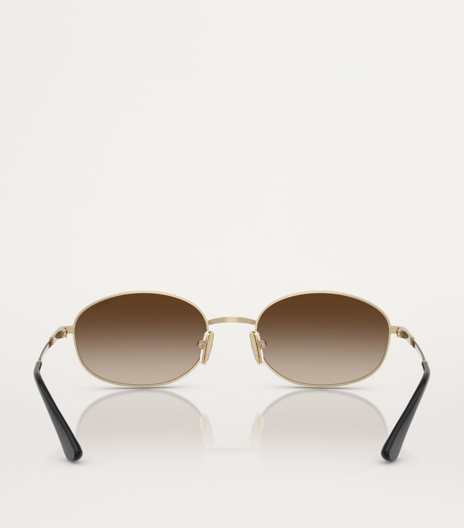 Vogue metal sunglasses with graduated tint lenses, imported from the UK
