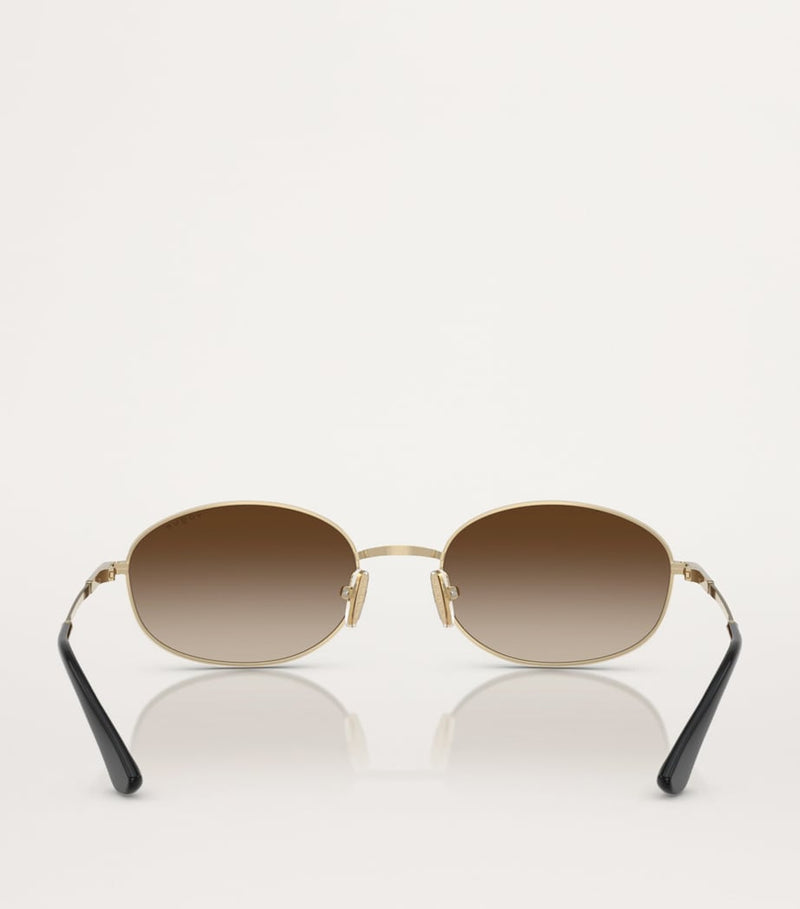 Vogue metal sunglasses with graduated tint lenses, imported from the UK