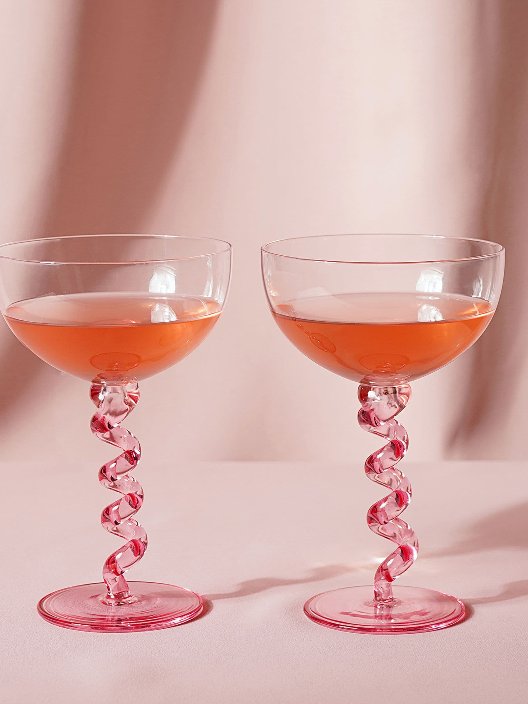 Widdop pink twisted stem coupe glasses, UK version