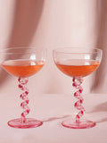 Widdop pink twisted stem coupe glasses, UK version