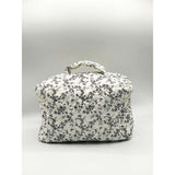 SVNX floral cosmetic toiletry bag black and white, imported from the UK
