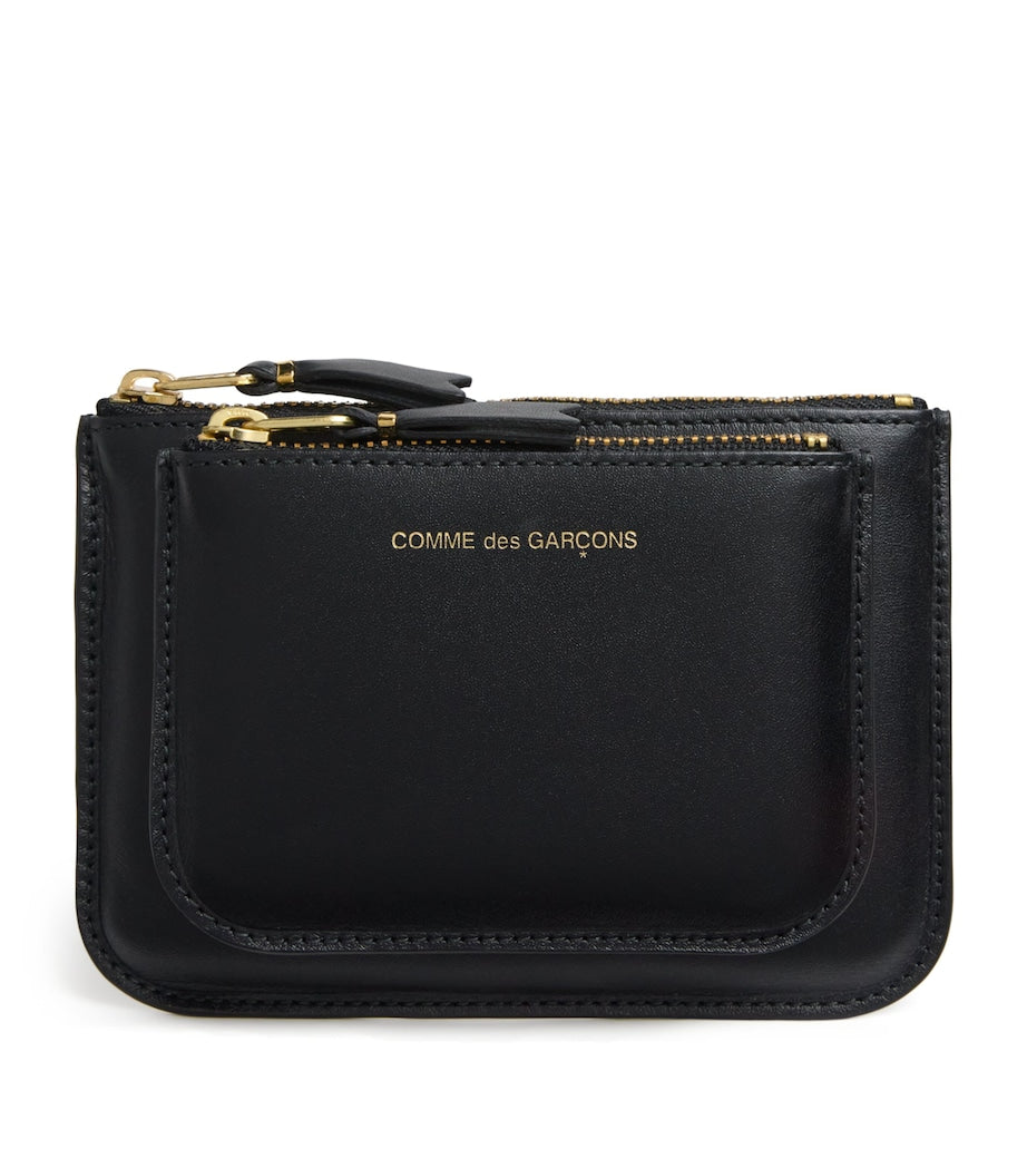 Comme des Garçons medium leather logo wallet, UK version