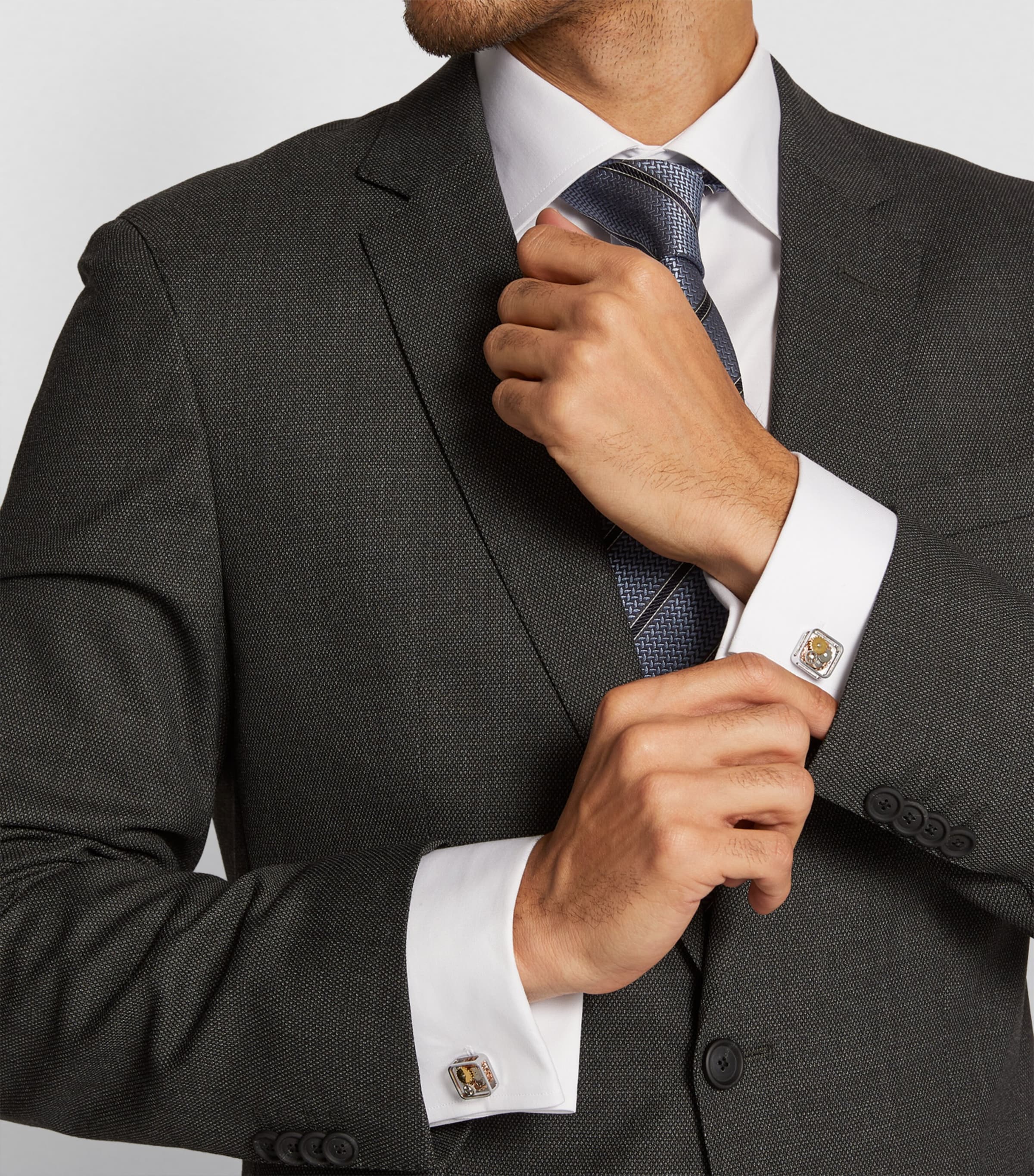 Tateossian cufflinks with square gear design, imported from the UK