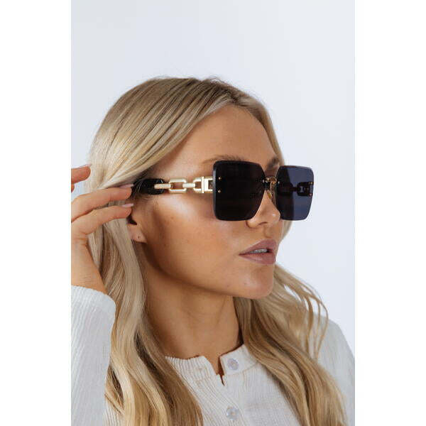 SVNX rimless oversized square sunglasses in black gold (British brand)