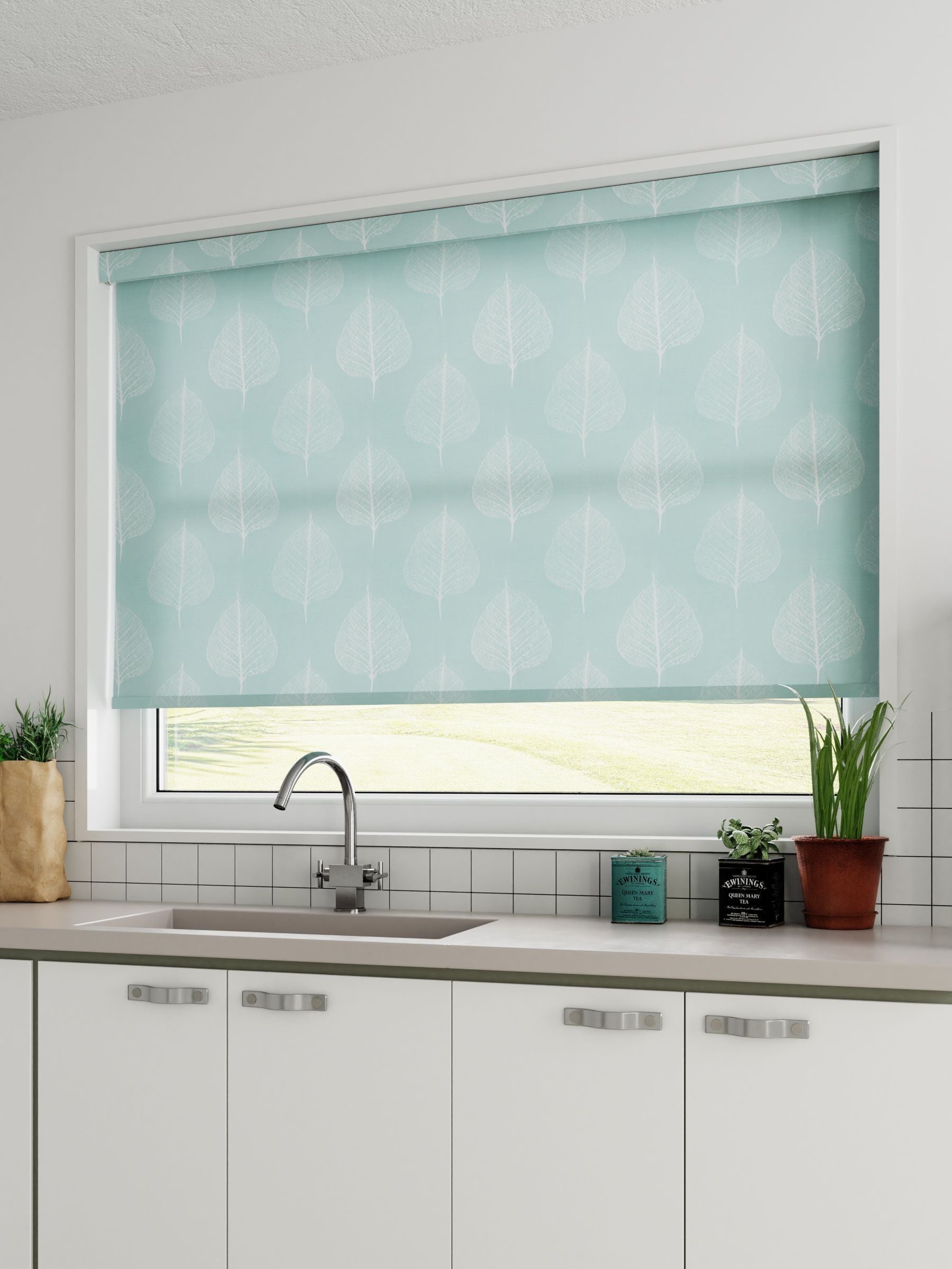 Jade Blue roller blind made to measure with woven leaf fabric, imported from the UK