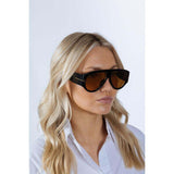 SVNX oversized rounded sunglasses black frames tea lenses (British brand)