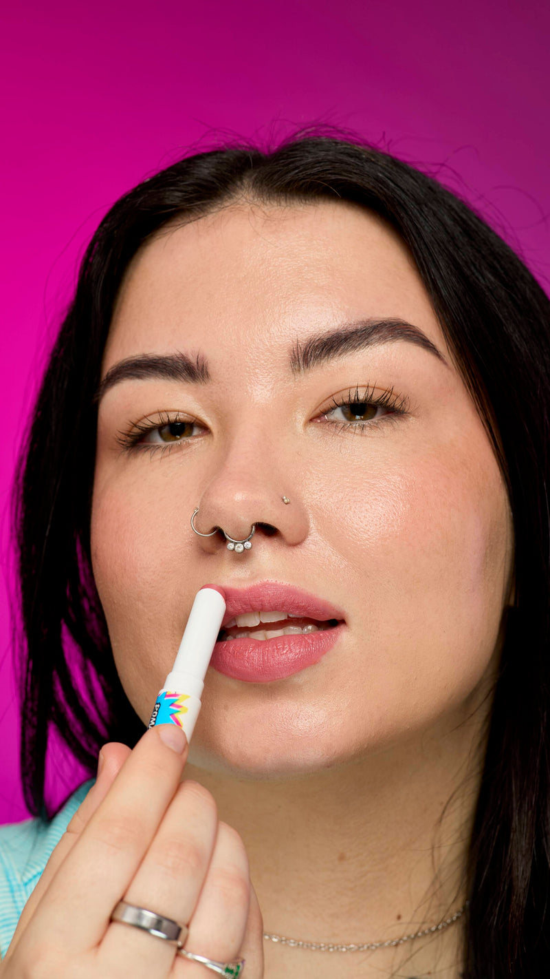 Lipstick in Roman Candle dewy peachy shade, UK version