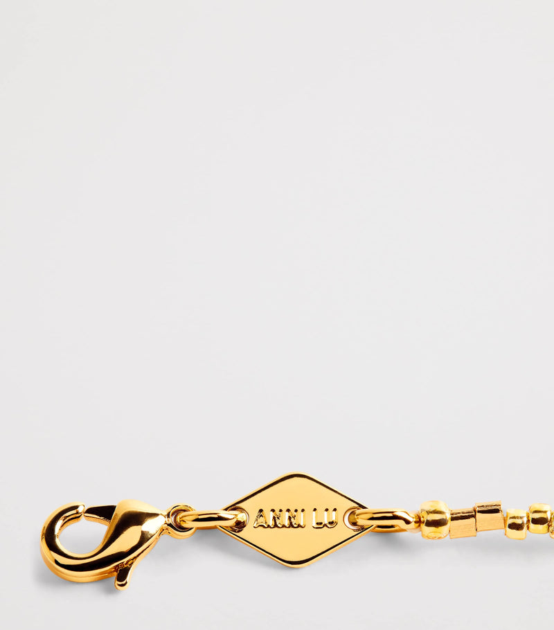 Anni Lu gold-plated beaded asymmetrical bracelet (British brand)