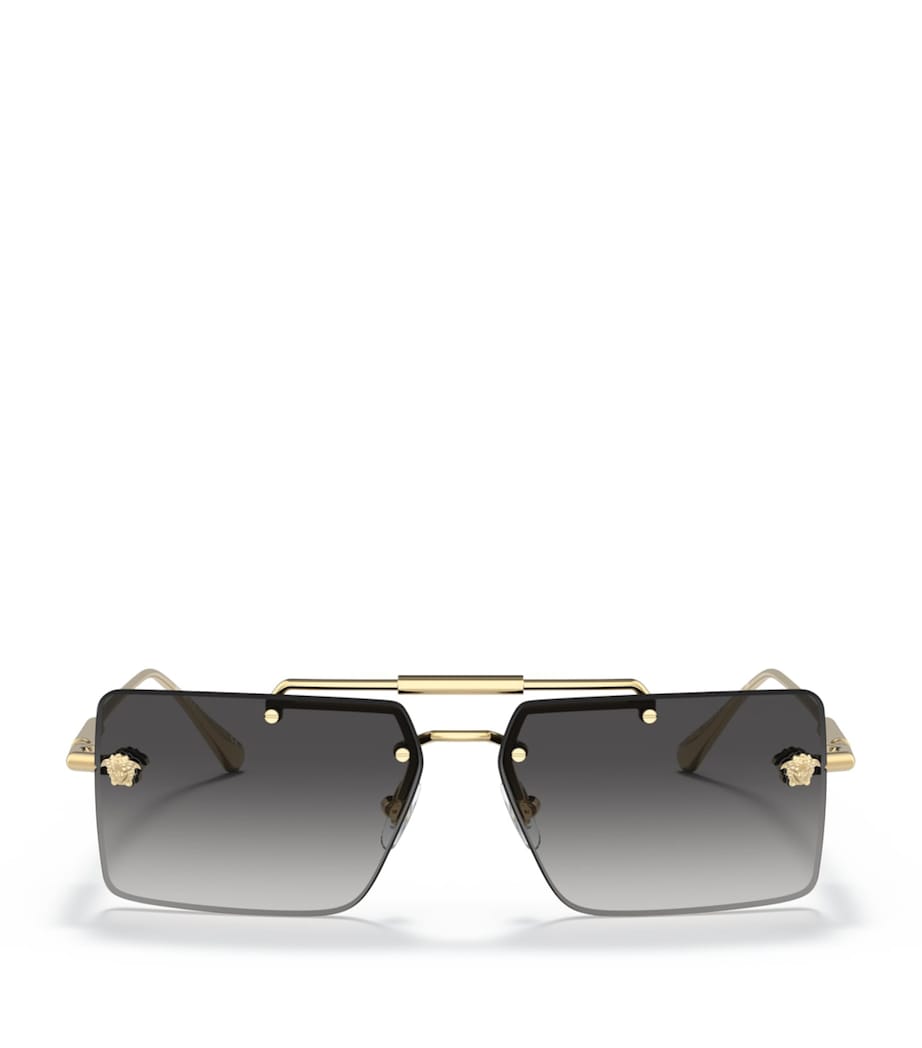 Lunettes de soleil rectangulaires sans monture Versace en métal doré - Produit britannique