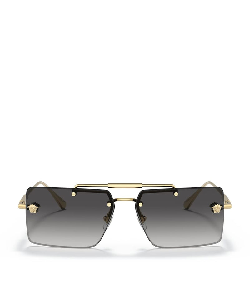 Lunettes de soleil rectangulaires sans monture Versace en métal doré - Produit britannique