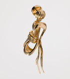 Miu Miu gold-tone metal bow earrings, imported from the UK