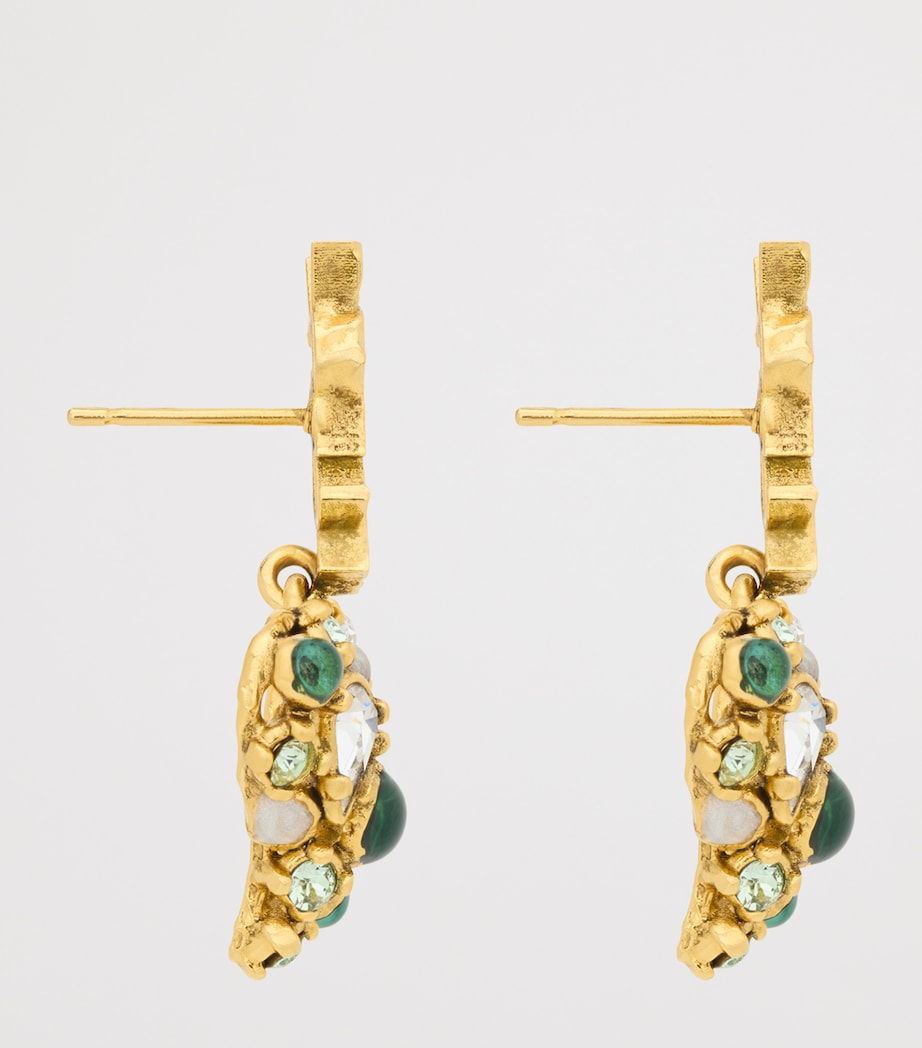 Boucles d'oreilles cœur Cassandre Saint Laurent dorées, version UK