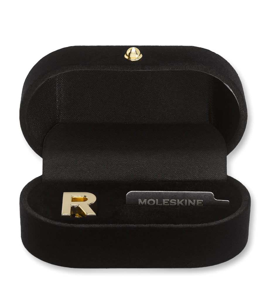Moleskine gold-plated R notebook charm, imported from the UK