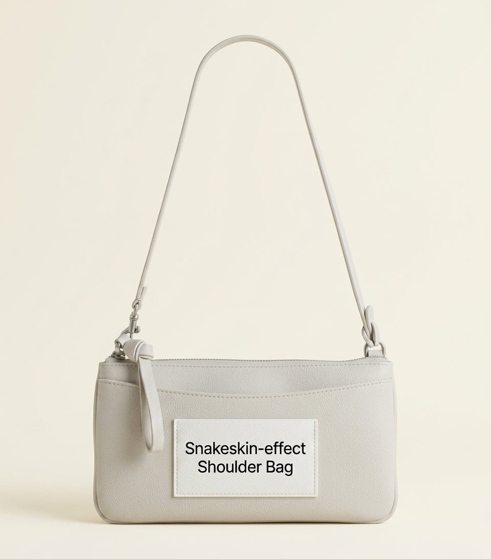 Balenciaga python-embossed calfskin pouch turn-lock closure (British brand)