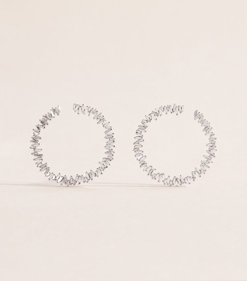 Suzanne Kalan white gold diamond sideways hoop earrings, imported from the UK