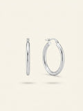 Vivienne Westwood Pauliana brass earring with orb design, imported from the UK
