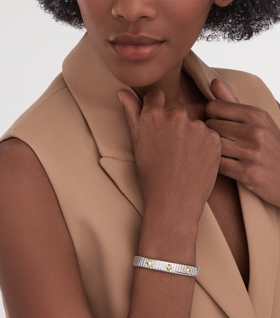 سوار Bvlgari Tubogas من الفولاذ المقاوم للصدأ والذهب الأصفر (ماركة بريطانية)