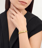 Bvlgari yellow gold Tubogas bangle with diamonds (British brand)