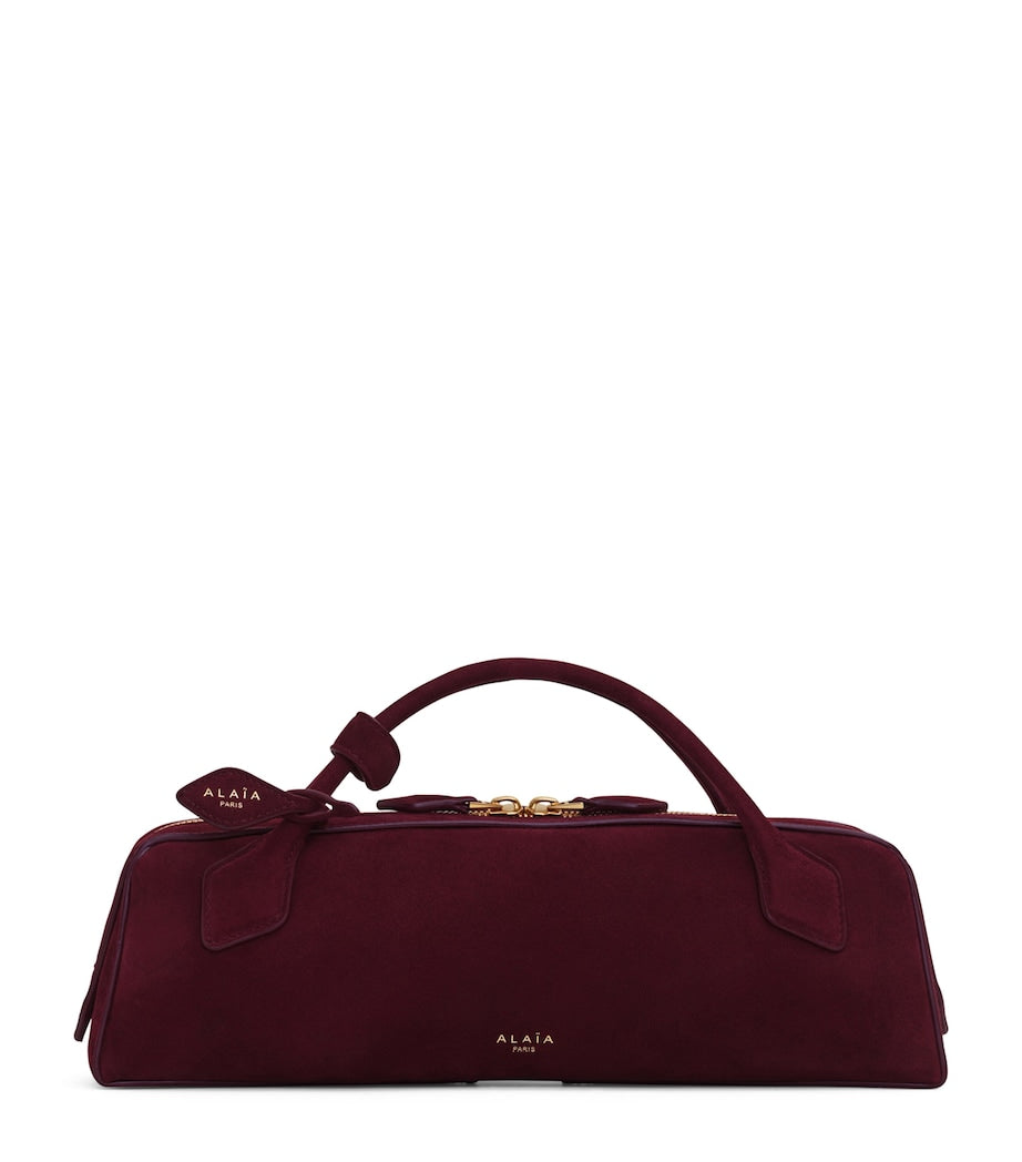 Alaïa Le Teckel suede top-handle bag, imported from the UK