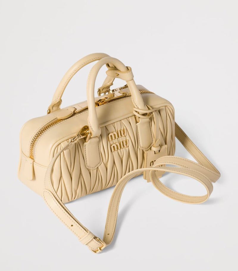 Miu Miu Arcadie matelassé leather top-handle bag, imported from the UK