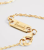 Harrods 18kt yellow gold pendant with 0.25ct diamond (British brand)