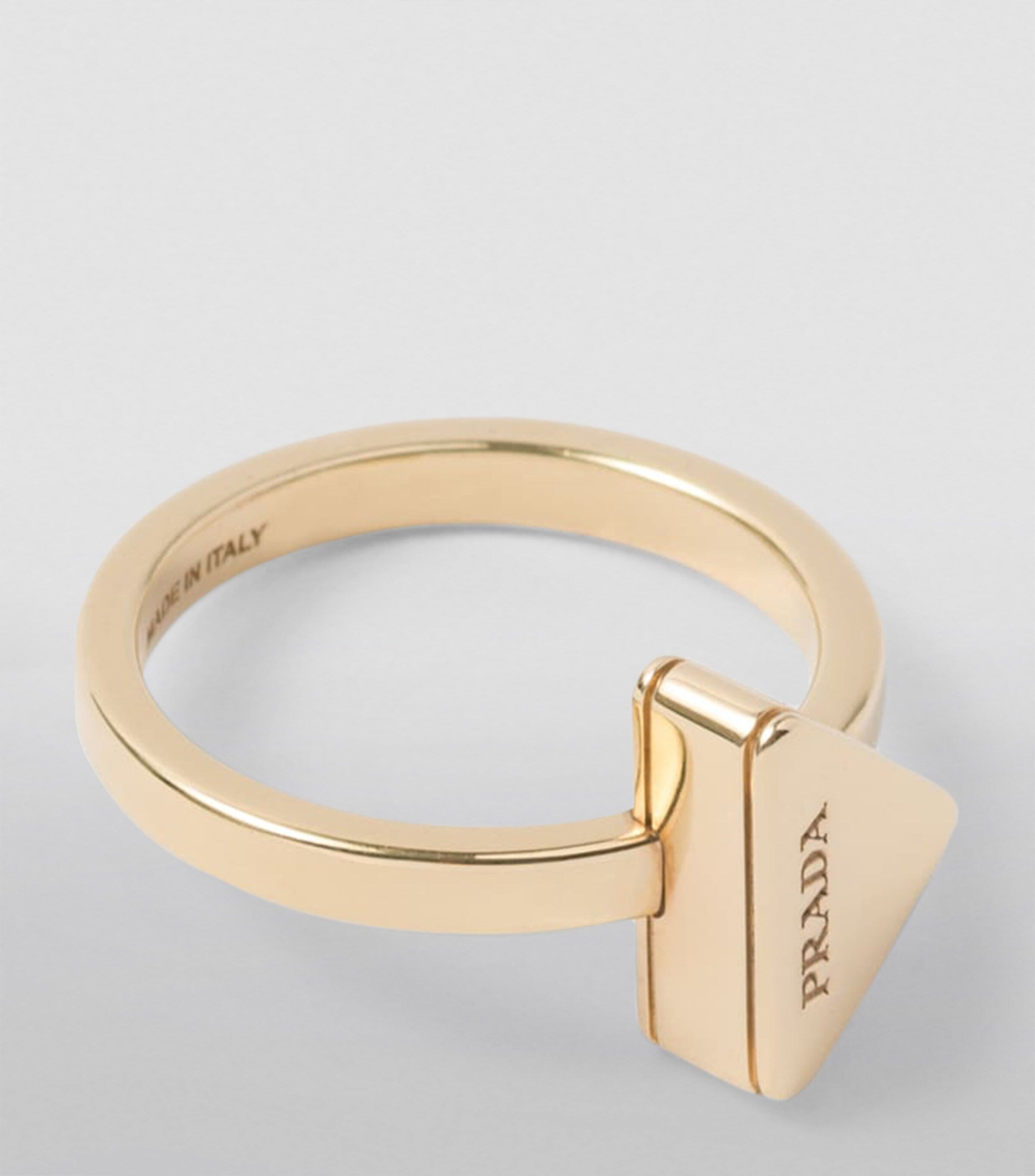 Prada triangle ring brass Italian design, imported from the UK
