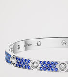 Cartier white gold LOVE bracelet with diamonds and sapphires, UK version