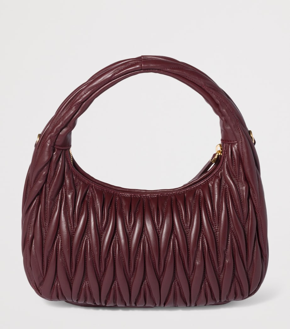 Miu Miu Wander matelassé leather top-handle bag (British brand)