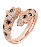 Cartier rose gold Panthère ring with diamonds, emerald, and onyx - British product