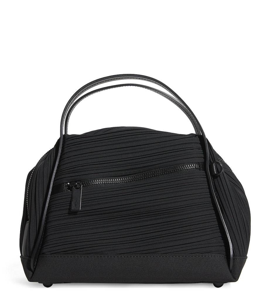 Pleats Please Issey Miyake mini bias pleats duffle bag, imported from the UK