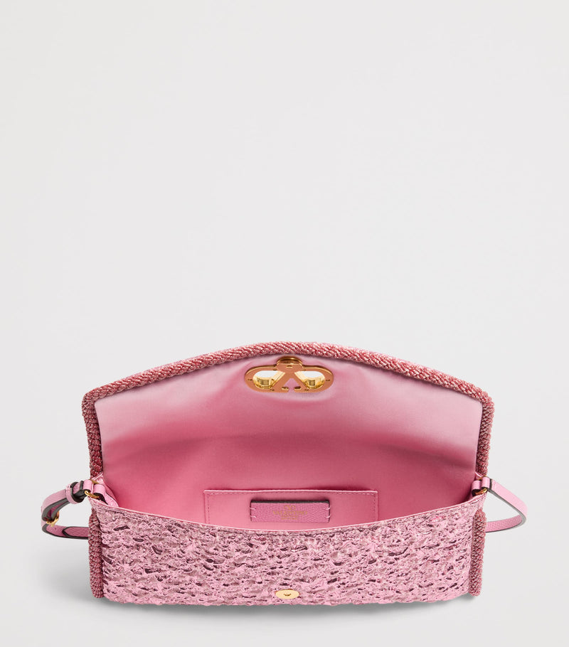 Valentino Garavani Metallic Vain soft shoulder bag, imported from the UK