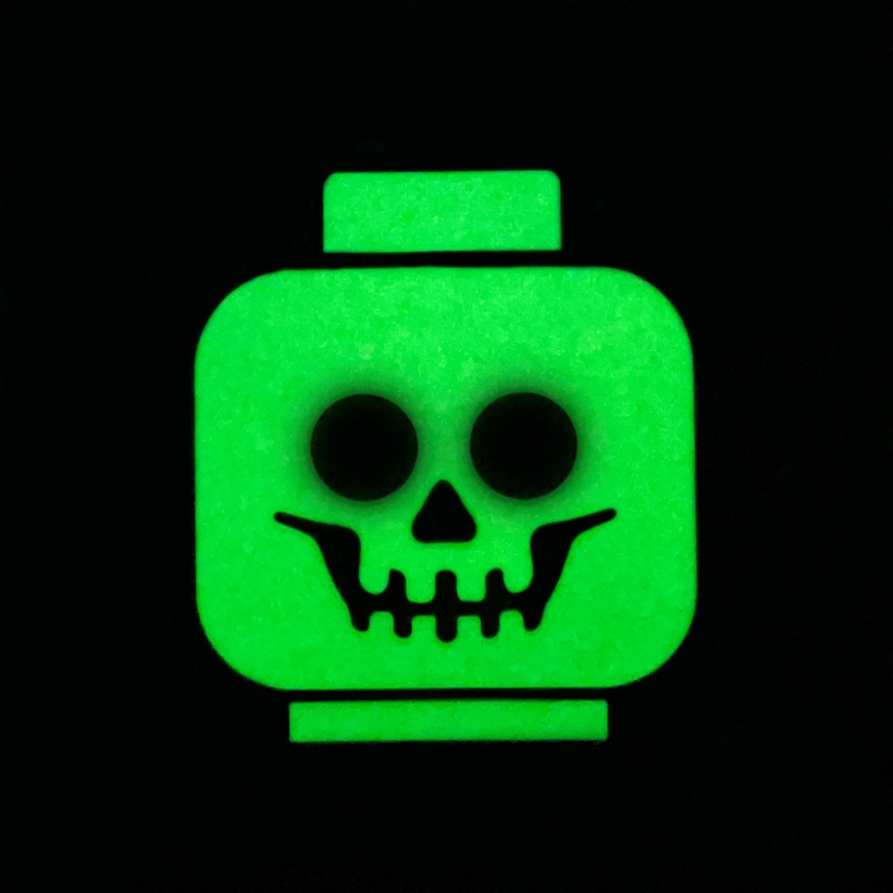 LEGO glow-in-the-dark skeleton bag tag, UK version