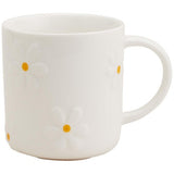 M&S embossed daisy mug in cream, imported from the UK