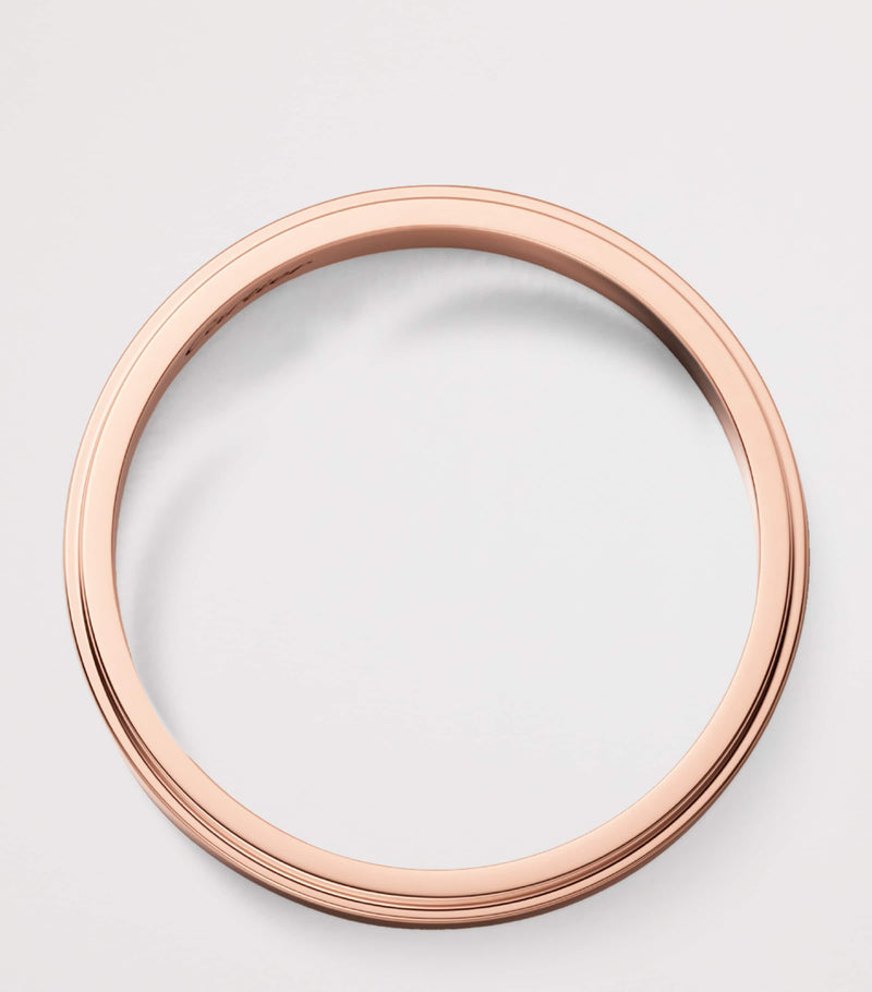 Cartier d'Amour rose gold wedding ring, imported from the UK