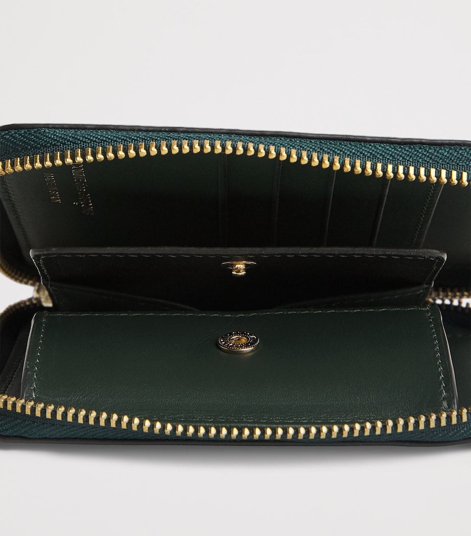 Comme des Garçons small leather pouch from Wallet line, UK version