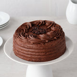 Vegan chocolatey cake slice with brownie fudge pieces - British product