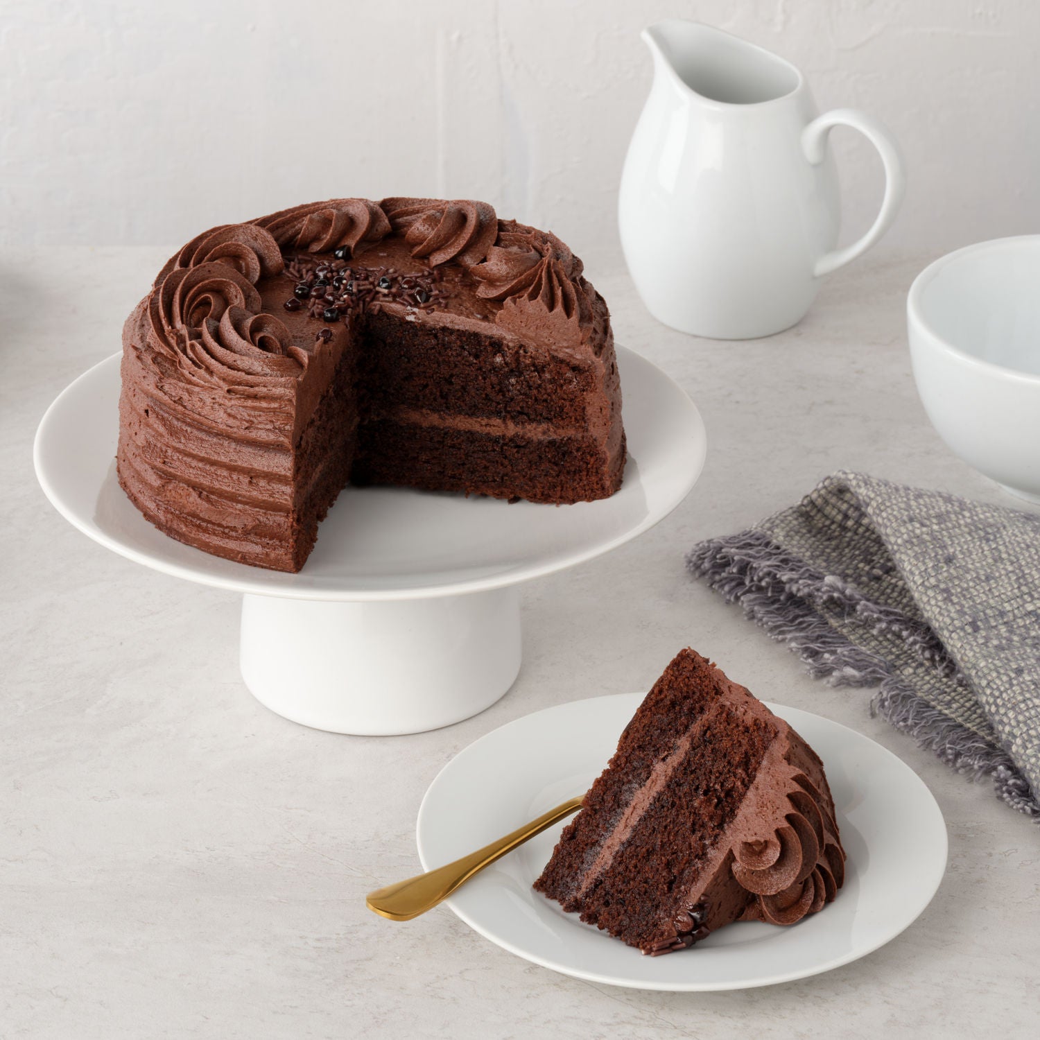 Vegan chocolatey cake slice with brownie fudge pieces - British product
