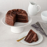Vegan chocolatey cake slice with brownie fudge pieces - British product